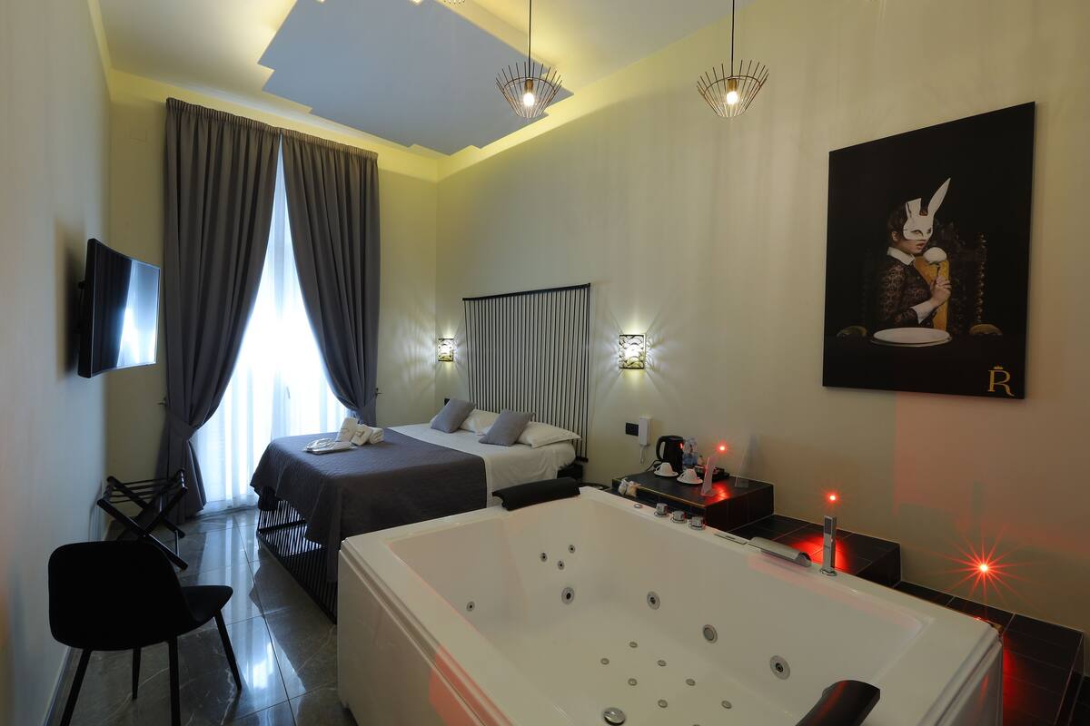 Deluxe Suite, Hot Tub, (La Regina) | Literie de qualité supérieure, minibar, coffres-forts dans les chambres