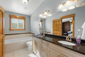 Shower, jetted bath, hair dryer, towels