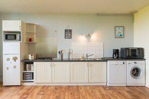 Superior-huoneisto, kylpyhuone makuuhuoneen yhteydessä (Sancho Turgot) | Jaettu keittiö | Syöttötuoli