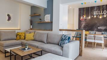 Deluxe Apartment, 5 Bedrooms, Terrace, City View | Living area | 40-inch flat-screen TV with digital channels, Smart TV