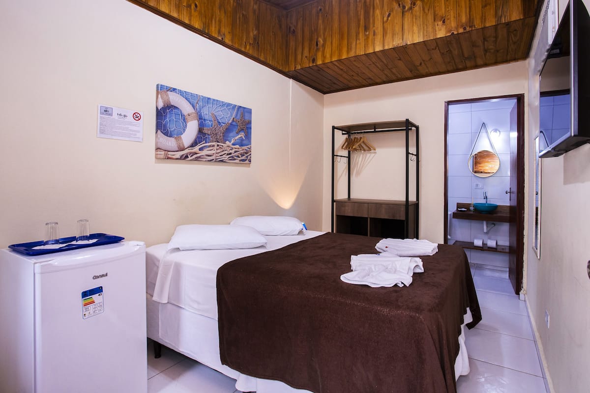 Economy-Suite, 1 Doppelbett | 1 Schlafzimmer, Minibar, kostenloses WLAN, Bettwäsche