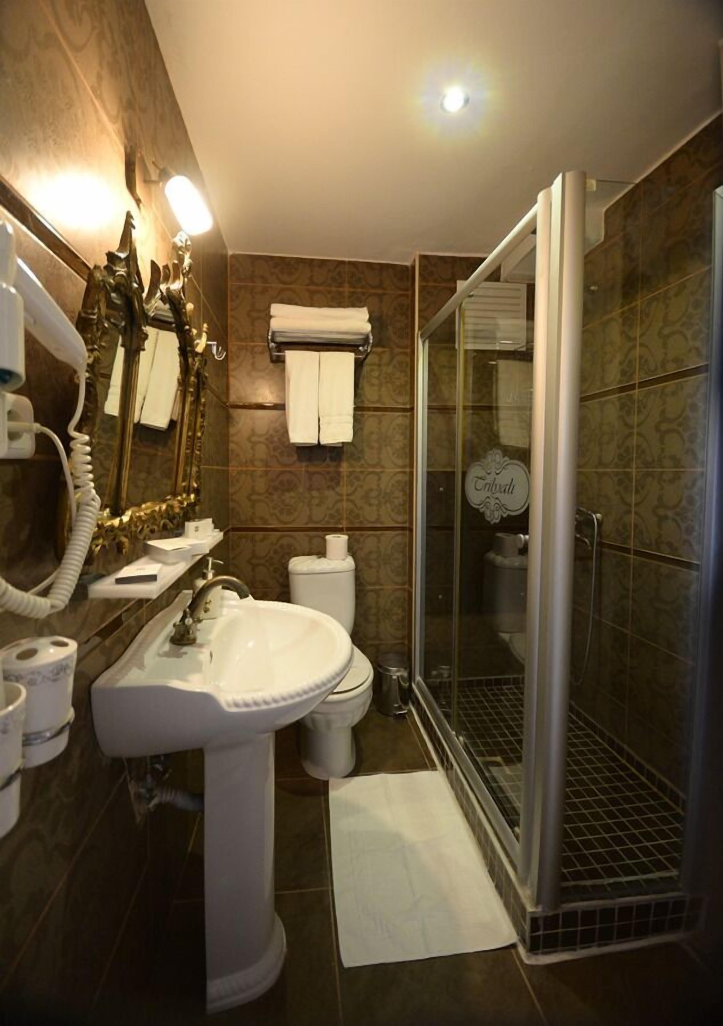 shower, free toiletries, hair dryer, slippers