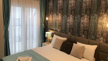 Apartemen Mewah, pemandangan kebun | Setrika/meja setrika dan tempat tidur bayi (biaya tambahan)