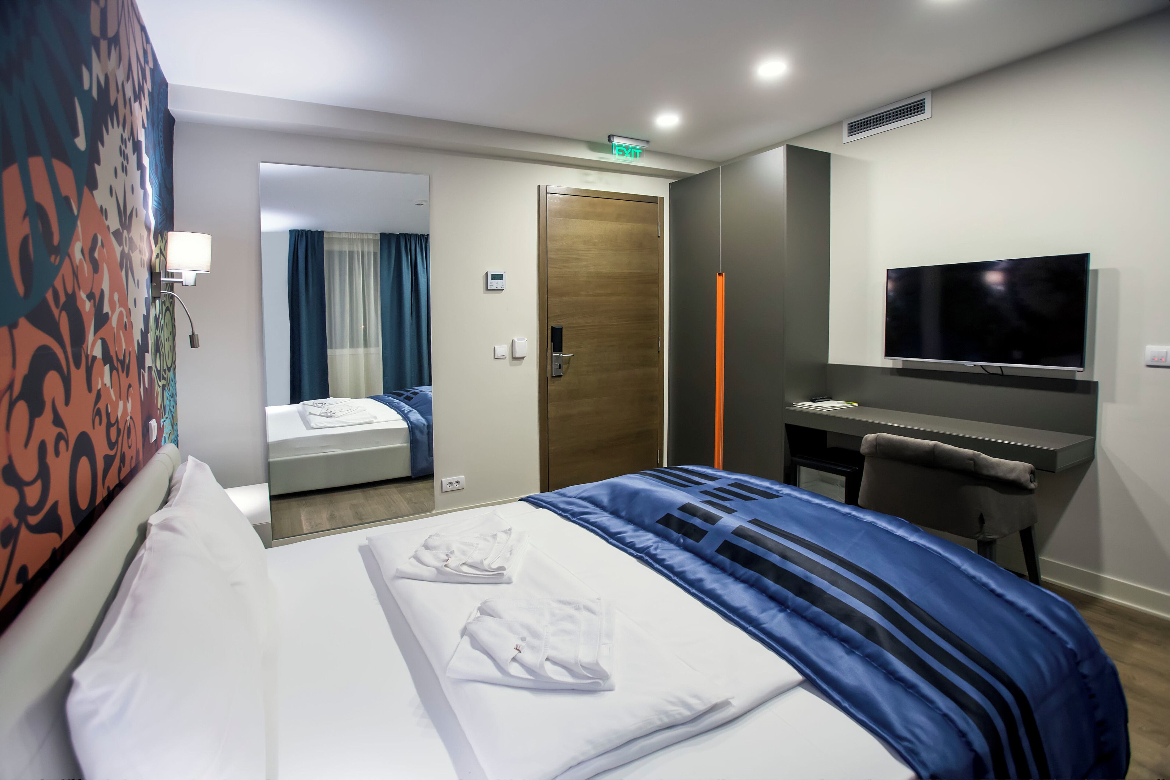 Kamar Double Deluks untuk 1 Orang | Minibar, meja kerja, tirai kedap cahaya, dan kedap suara