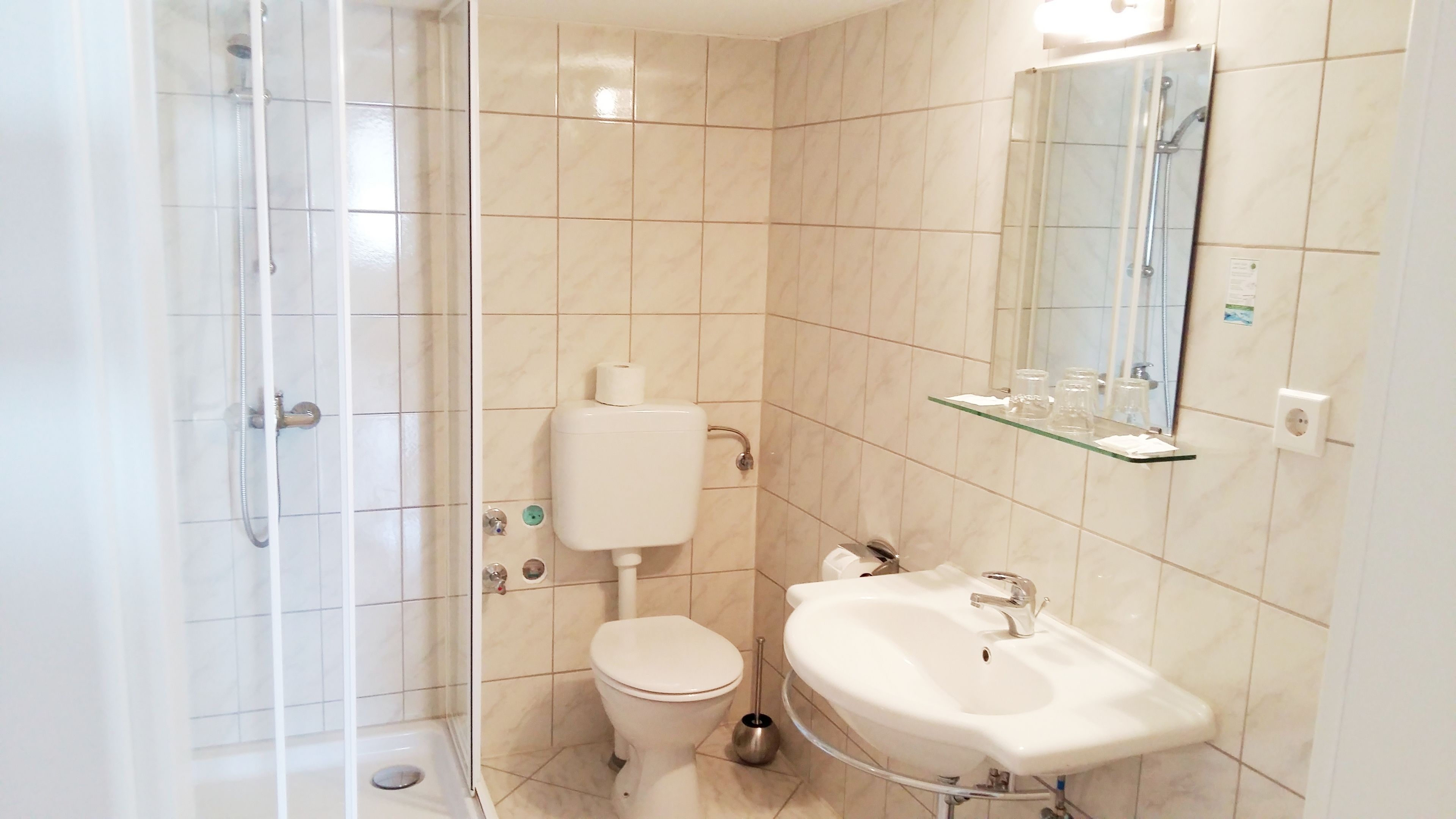 shower, free toiletries, hair dryer, towels