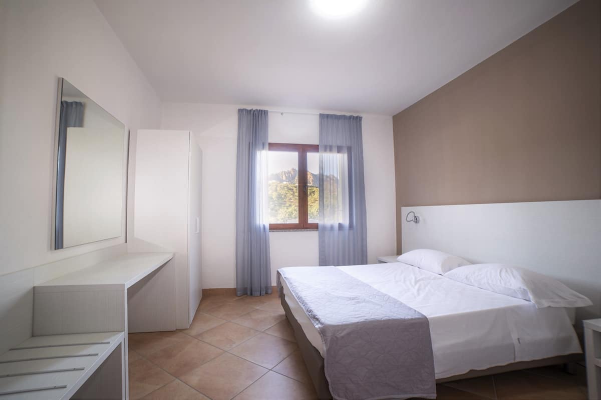 1 bedroom, premium bedding, blackout curtains, iron/ironing board