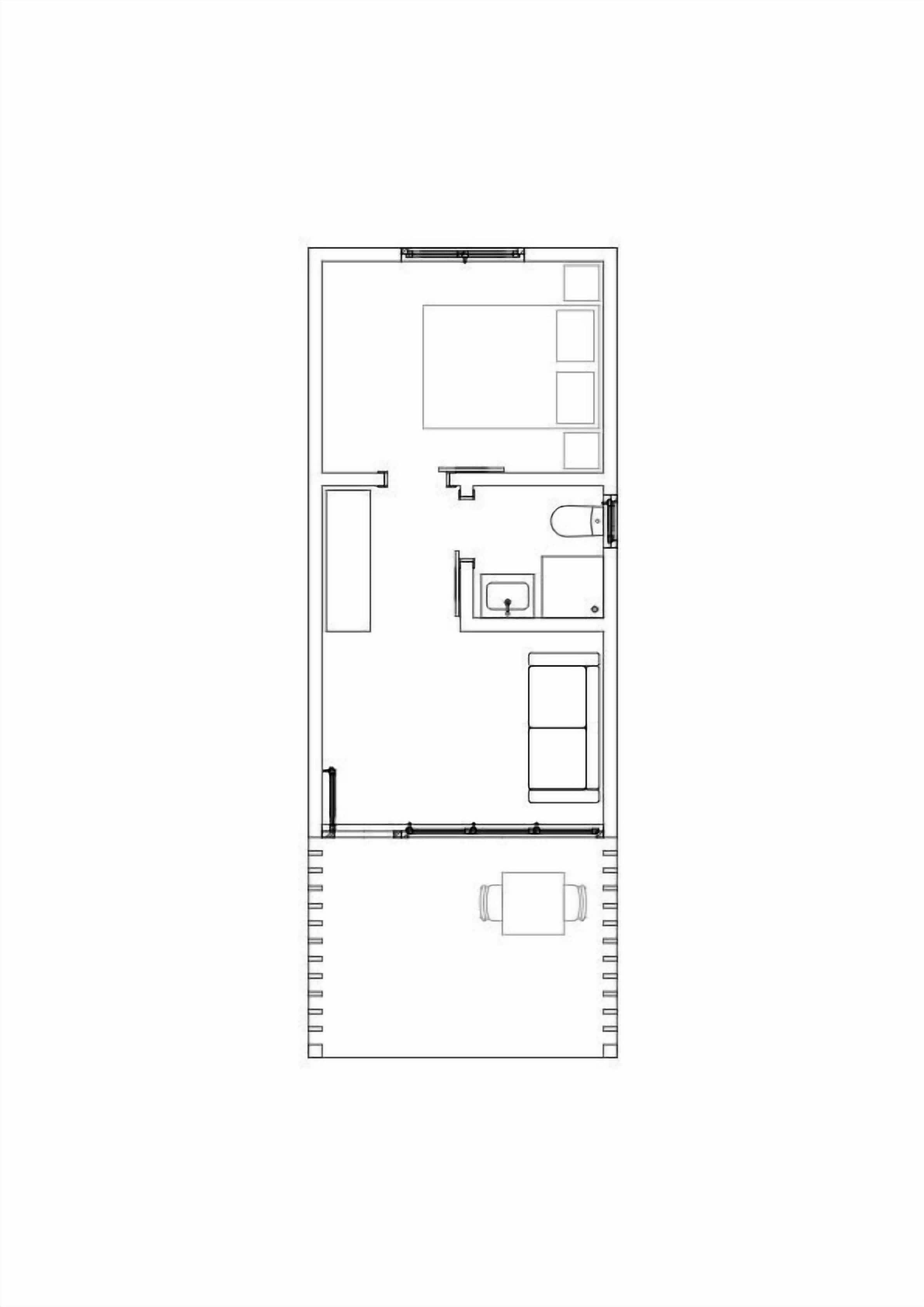 A floor plan of a hotel room with a bed, a desk, a chair, a small bathroom, and a window.