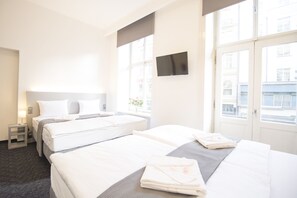 Quadruple Room, Balcony | Hypo-allergenic bedding, desk, laptop workspace, blackout drapes - Narodni Stay (Prague)