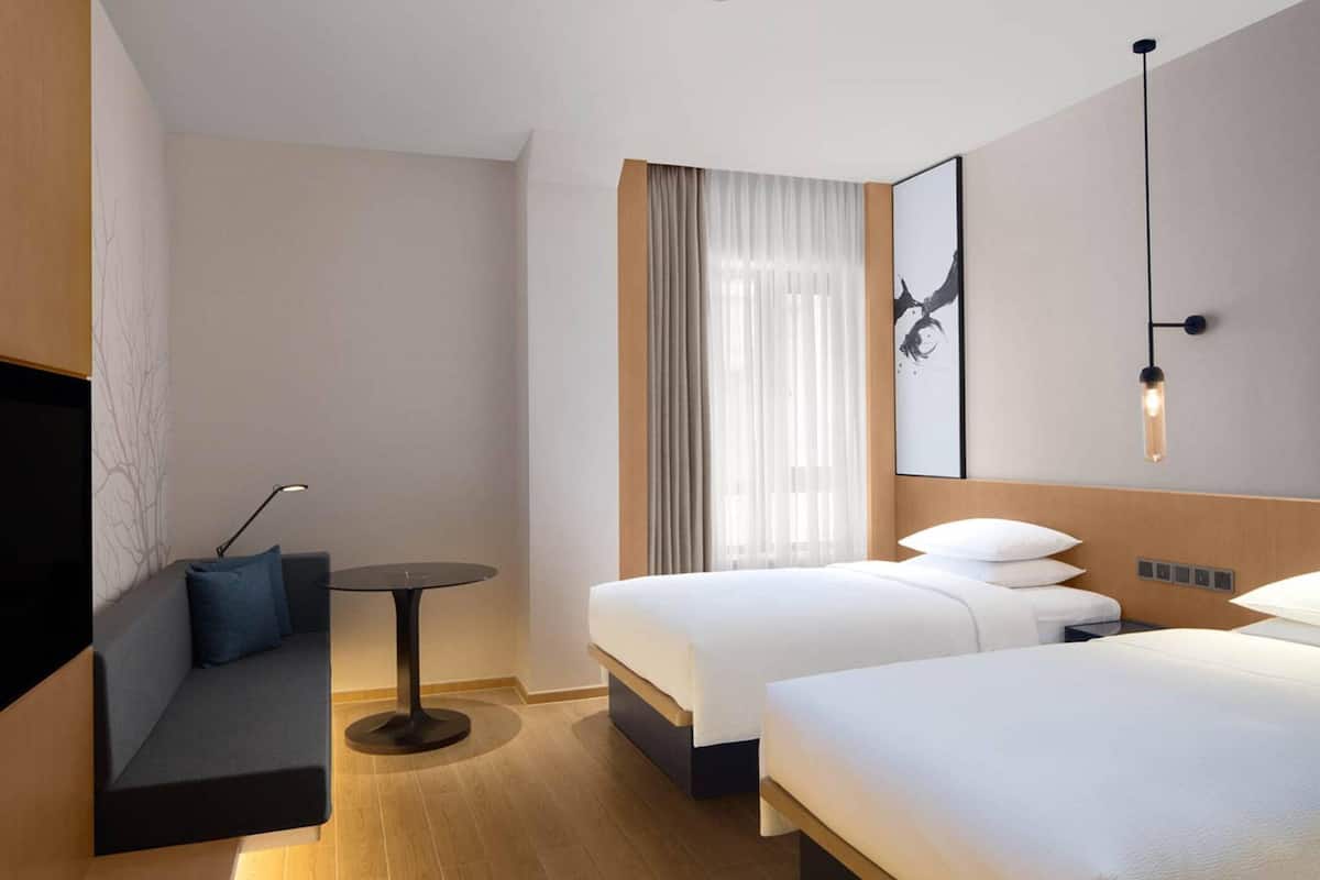 Deluxe Room, 2 Twin Beds | 1 bedroom, down comforters, in-room safe, desk