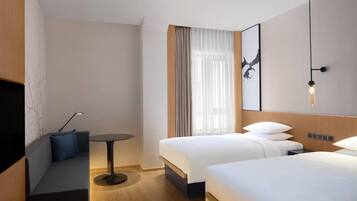 Deluxe Room, 2 Single Beds | 1 bedroom, down duvets, in-room safe, desk