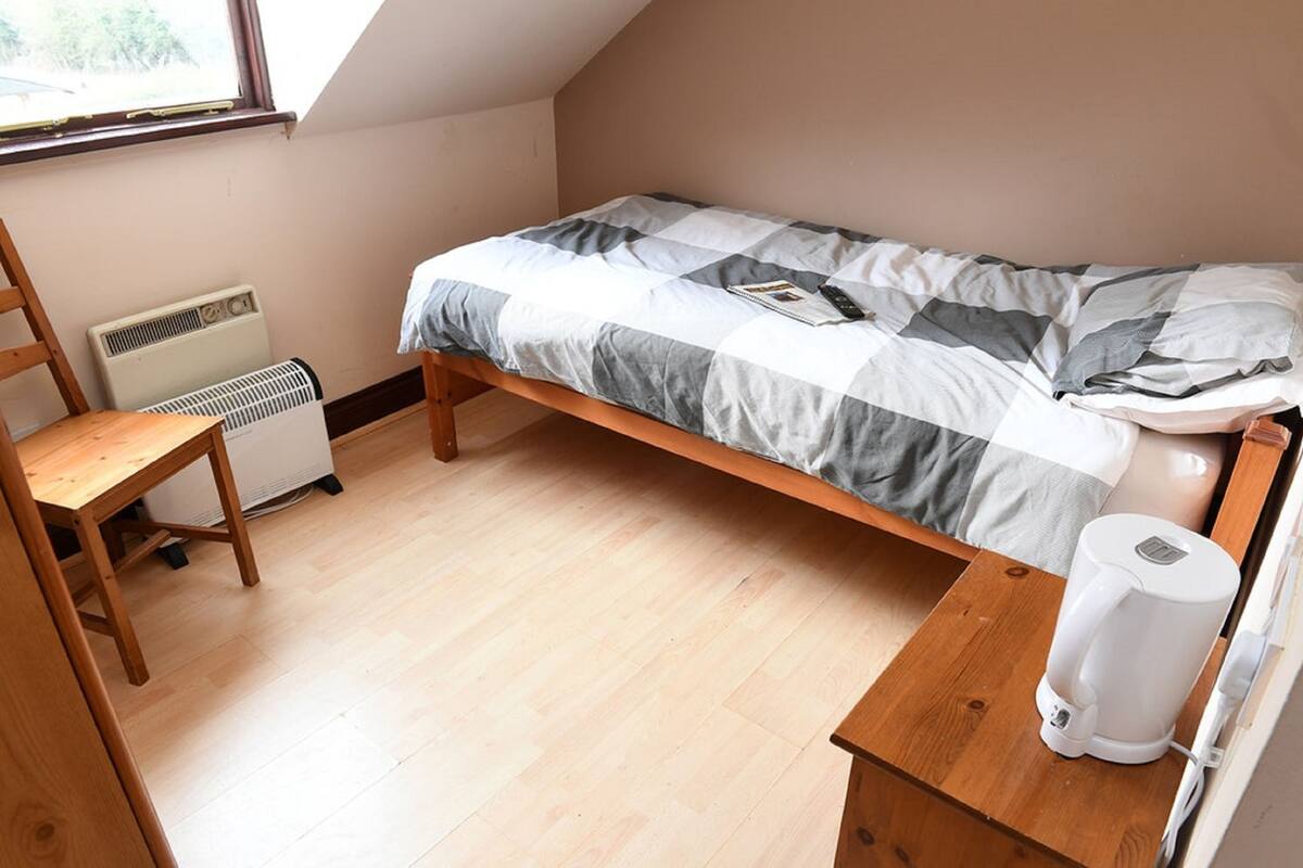 Standard Single Room | Iron/ironing board (on request)