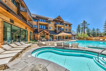 Outdoor pool, open 8 AM to 10 PM, pool umbrellas, sun loungers at Zalanta Resort at the Village