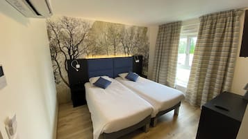 Comfort Twin Room | 1 bedroom, desk, laptop workspace, blackout curtains