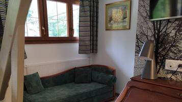 Chambre Signature | Coin séjour