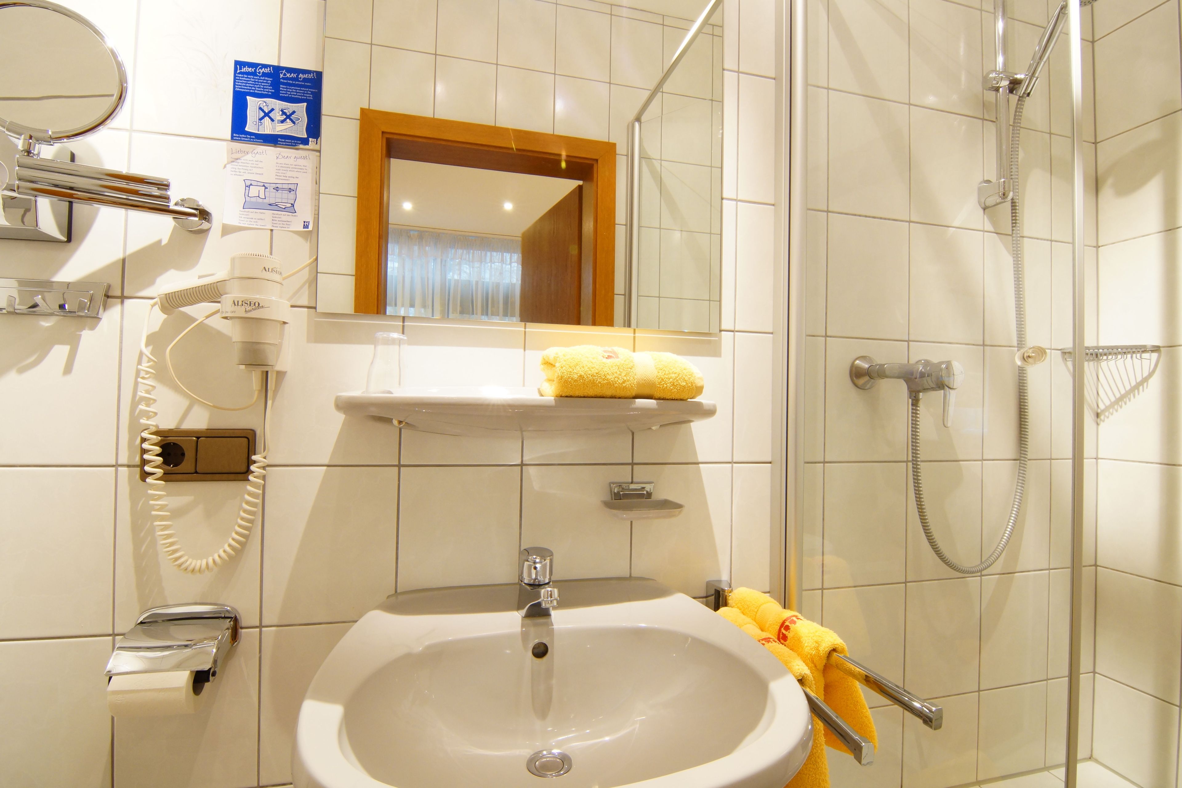 classic single room | bathroom | shower, free toiletries, hair dryer, towels