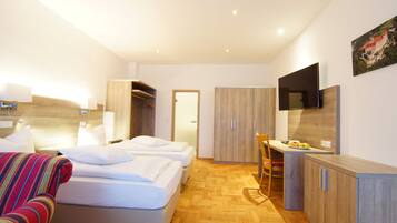 Deluxe Double Room, Balcony | Living area | 32-inch flat-screen TV with cable channels, TV