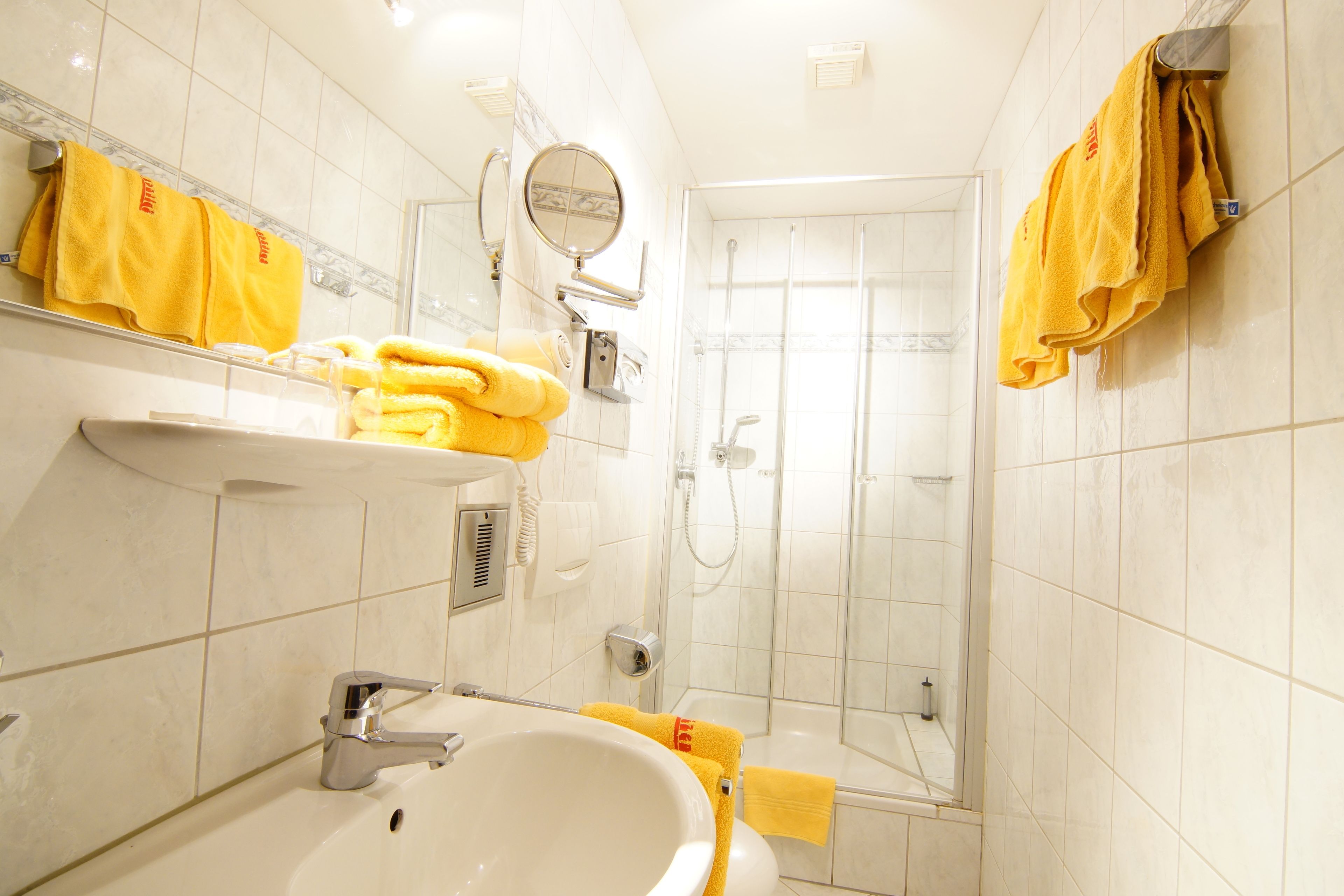 shower, free toiletries, hair dryer, towels