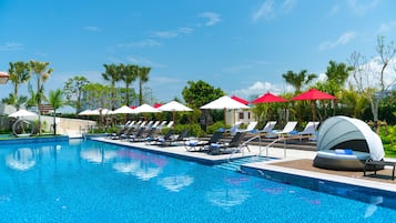 Indoor pool, seasonal outdoor pool, pool umbrellas, pool loungers