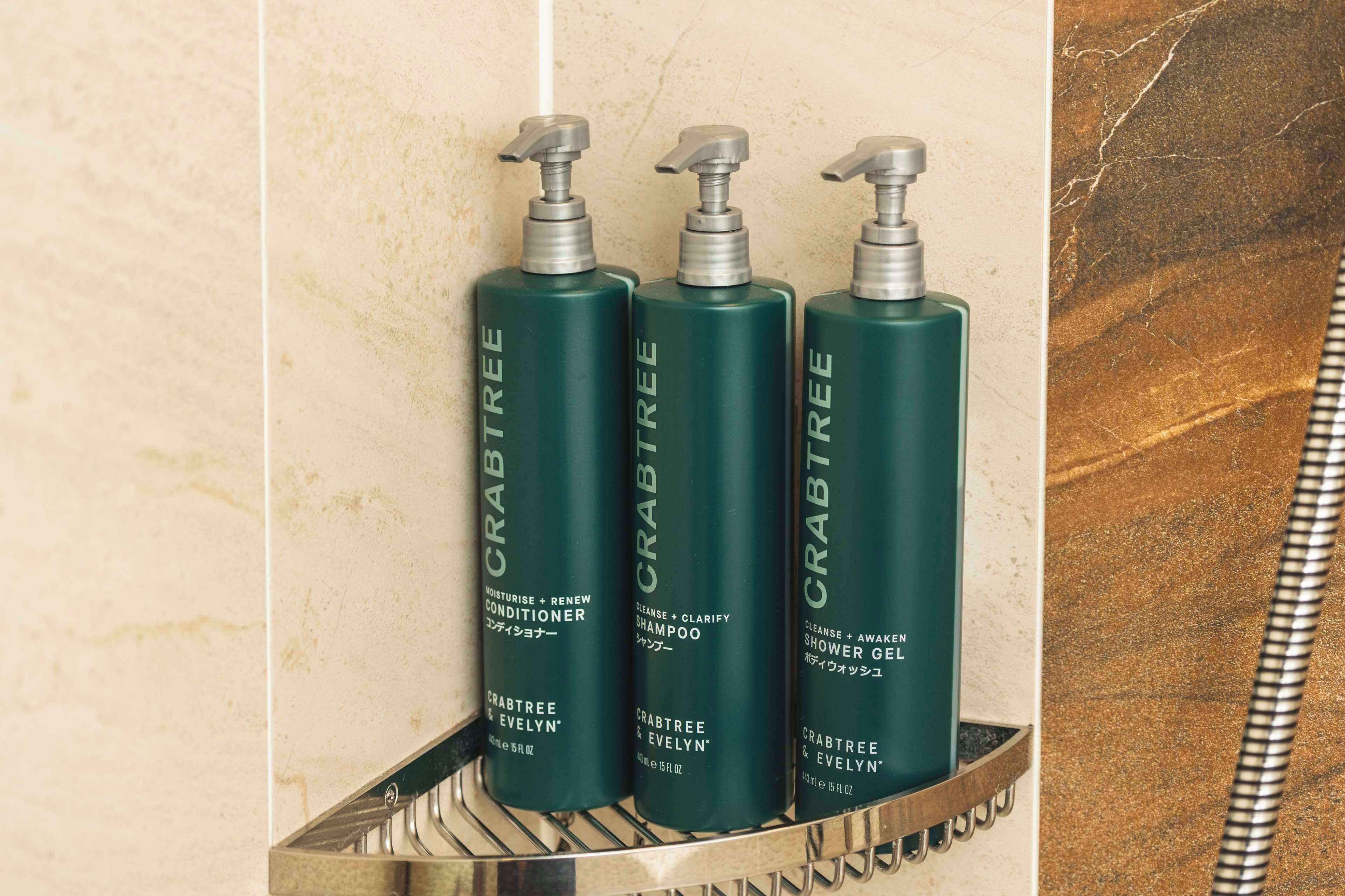 separate bathtub and shower, free toiletries, hair dryer, slippers