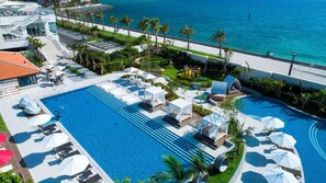Indoor pool, seasonal outdoor pool, pool umbrellas, pool loungers - DoubleTree by Hilton Okinawa Chatan Resort (Chatan)