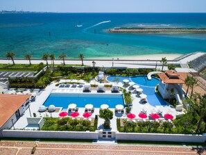 Indoor pool, seasonal outdoor pool, pool umbrellas, pool loungers - DoubleTree by Hilton Okinawa Chatan Resort (Chatan)