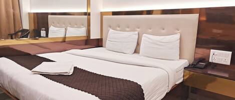 Deluxe Room non AC with Complimentary Wi-Fi | 1 bedroom, desk, free WiFi, bed sheets