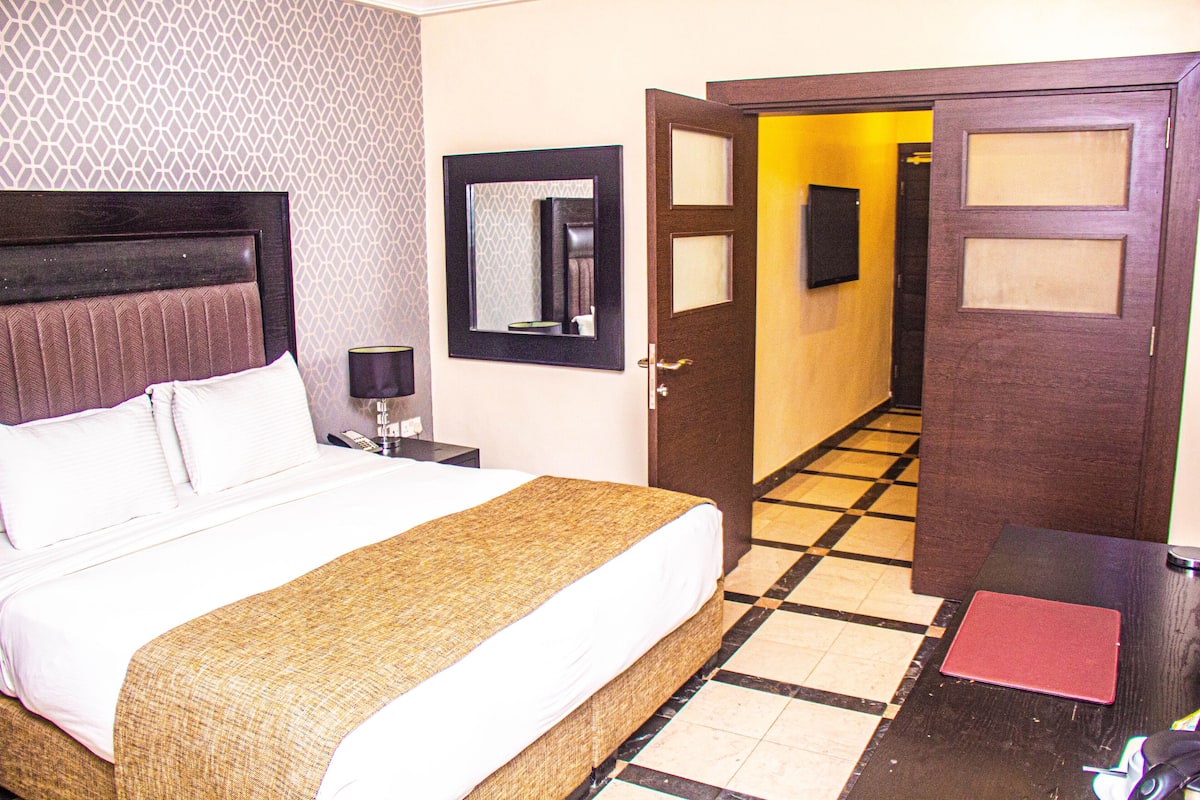 Family Suite, City View | 1 bedroom, desk, laptop workspace, free WiFi
