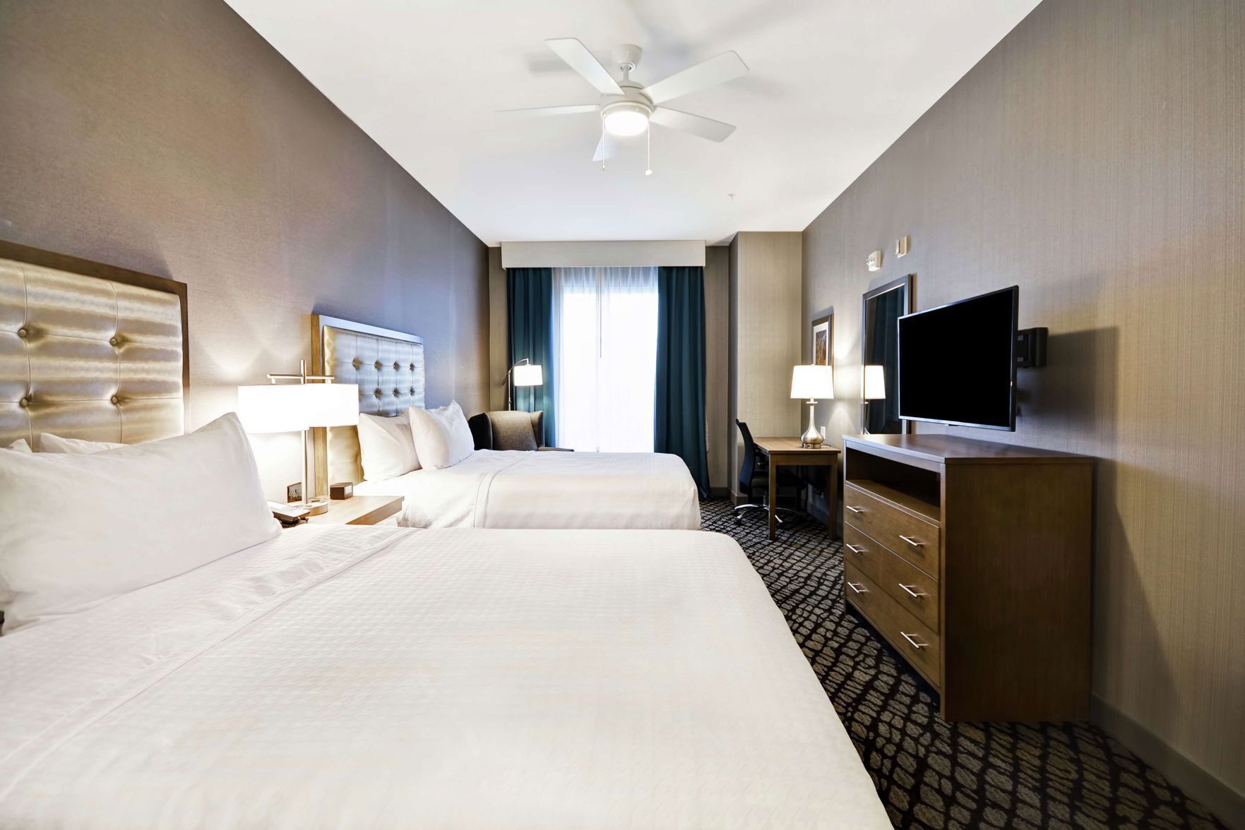 Premium bedding, in-room safe, individually decorated