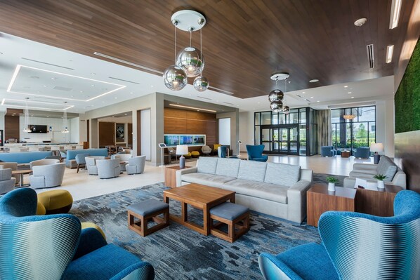 Lobby lounge, pool views, open daily - Residence Inn by Marriott Orlando at Millenia (Orlando)