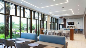 A modern interior with a bar area, seating, and large windows.