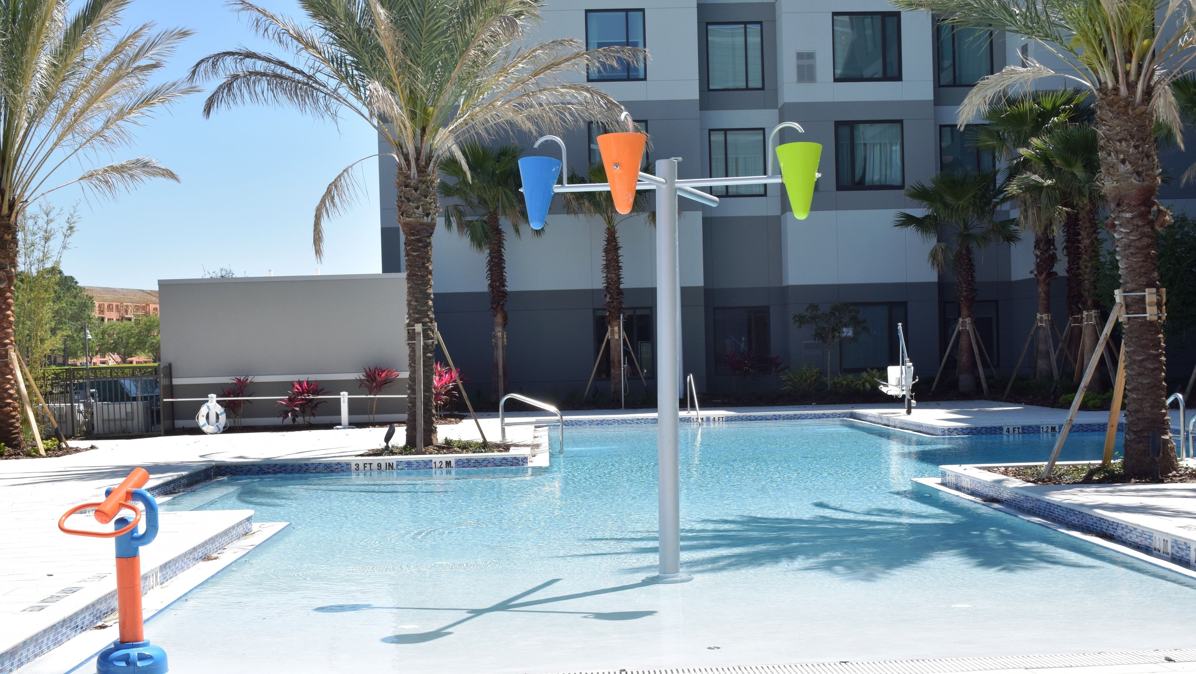 outdoor pool, open 6:00 am to 11:00 pm, pool umbrellas, pool loungers