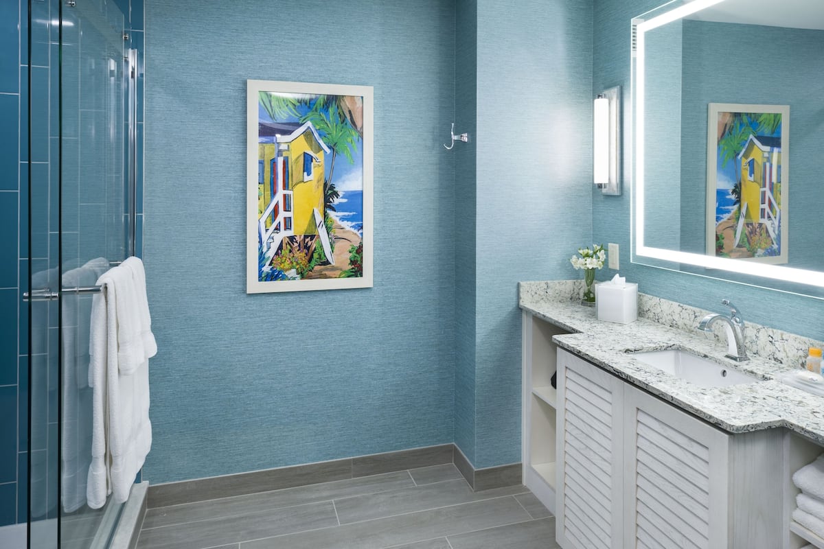 shower, rainfall showerhead, designer toiletries, hair dryer