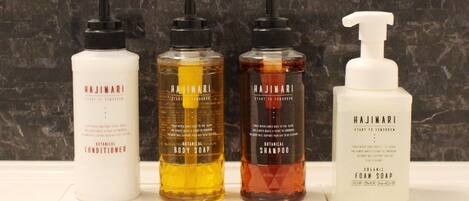 Four Hajimari body care products on a shelf.