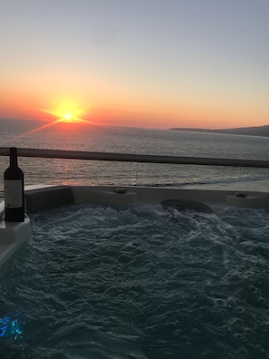 Enjoy a romantic evening with a glass of wine on the balcony overlooking the gently flowing water.