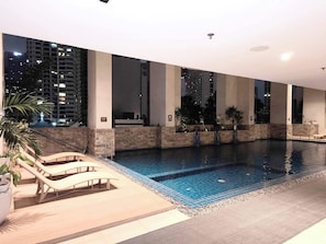 Indoor pool, open 8:00 AM to 7:00 PM, sun loungers - KL Executive Greenbelt KLX (Makati)