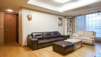 Apartment, 3 Bedrooms | Living room | Flat-screen TV