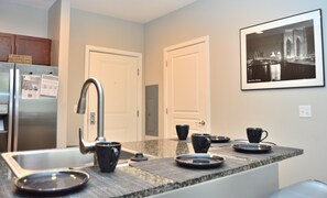 The Montclair Spacious Studio Steps 2 NYC | 1 bedroom, premium bedding, desk, iron/ironing board