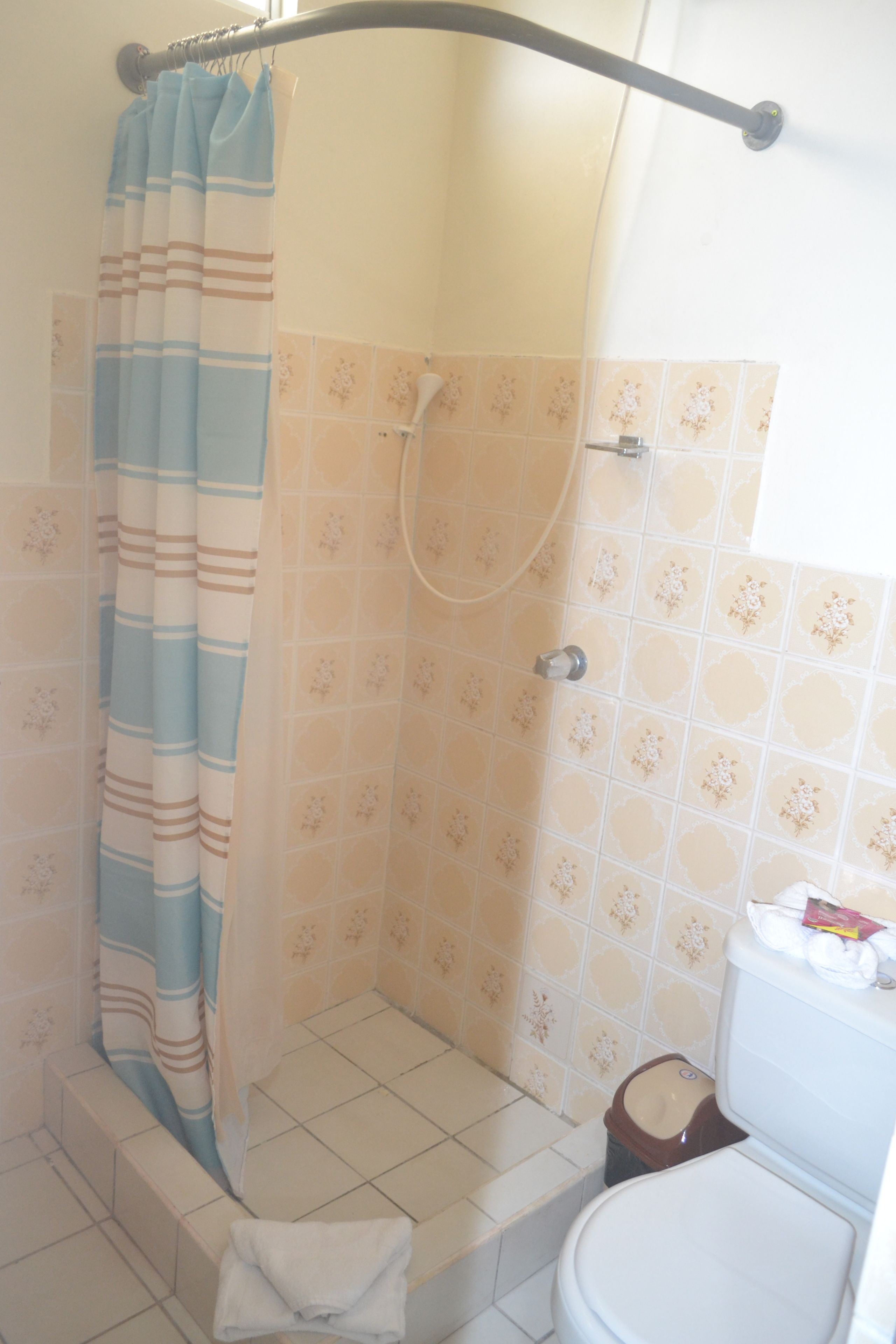 economy room, tower | bathroom shower