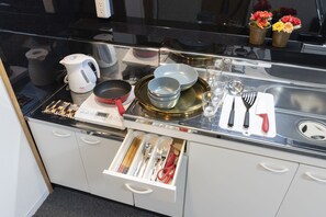 Fridge, microwave, cookware/dishes/utensils