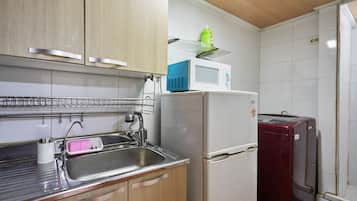 Full-size fridge, microwave, stovetop, electric kettle
