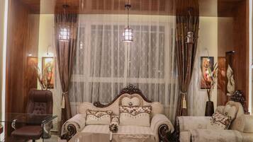 Family Suite | Living area | TV
