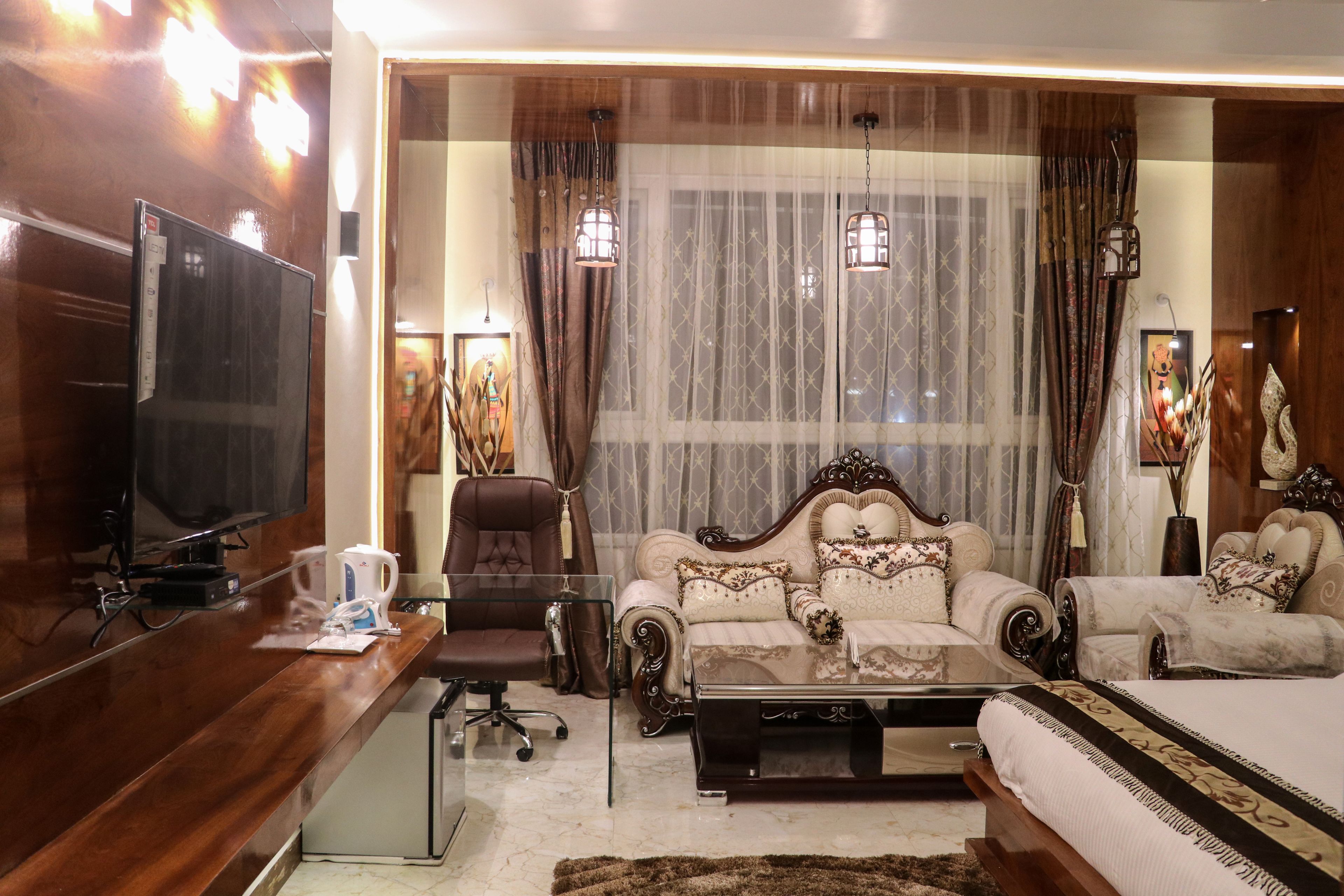 Family Suite | Living area | TV