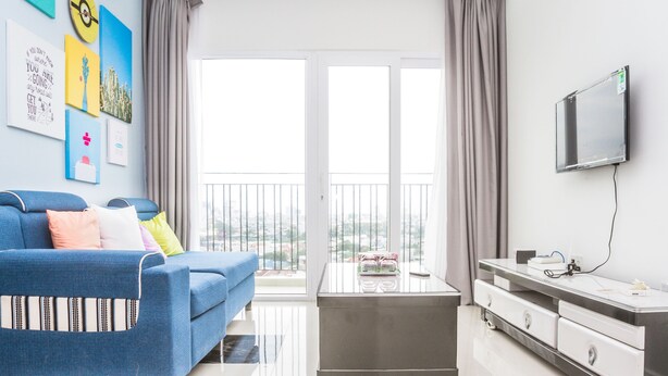 2 Bedrooms Apartment | Living area | LCD TV - Riverside Apartment in Monarchy Apartment (Da Nang)