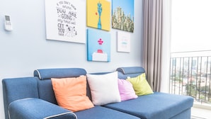2 Bedrooms Apartment | Living area | LCD TV - Riverside Apartment in Monarchy Apartment (Da Nang)