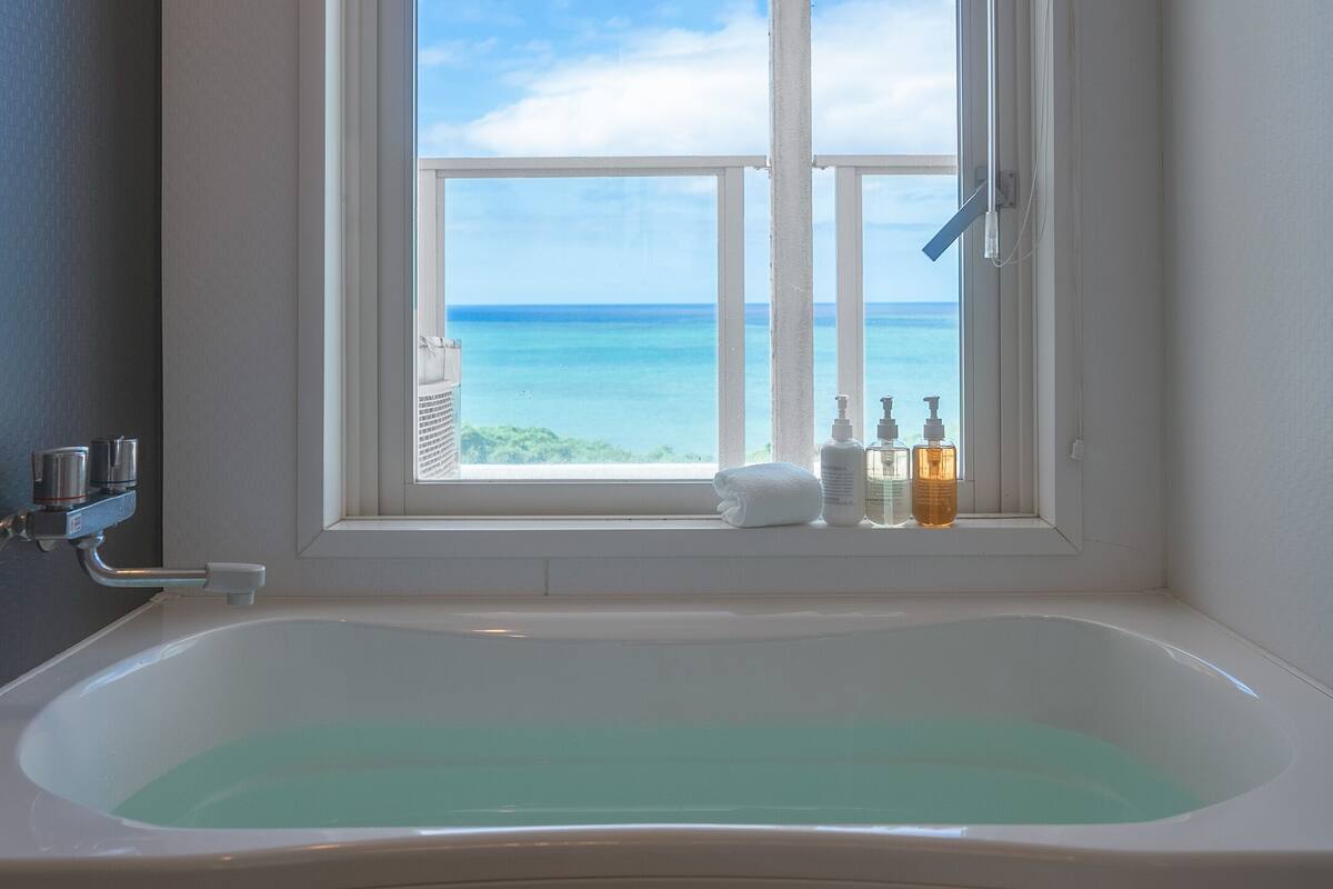 separate bathtub and shower, deep-soaking bathtub, free toiletries