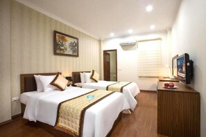 Deluxe Room | Minibar, in-room safe, desk, soundproofing - Spoon Hotel (Hanoi)