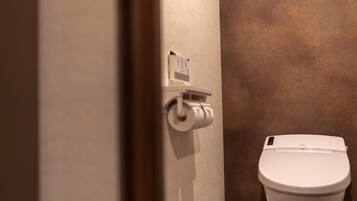 Free toiletries, hair dryer, slippers, electronic bidet