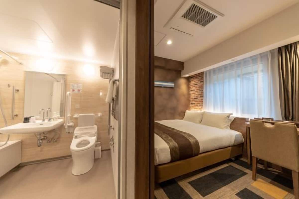 Bathroom | Free toiletries, hair dryer, slippers, electronic bidet