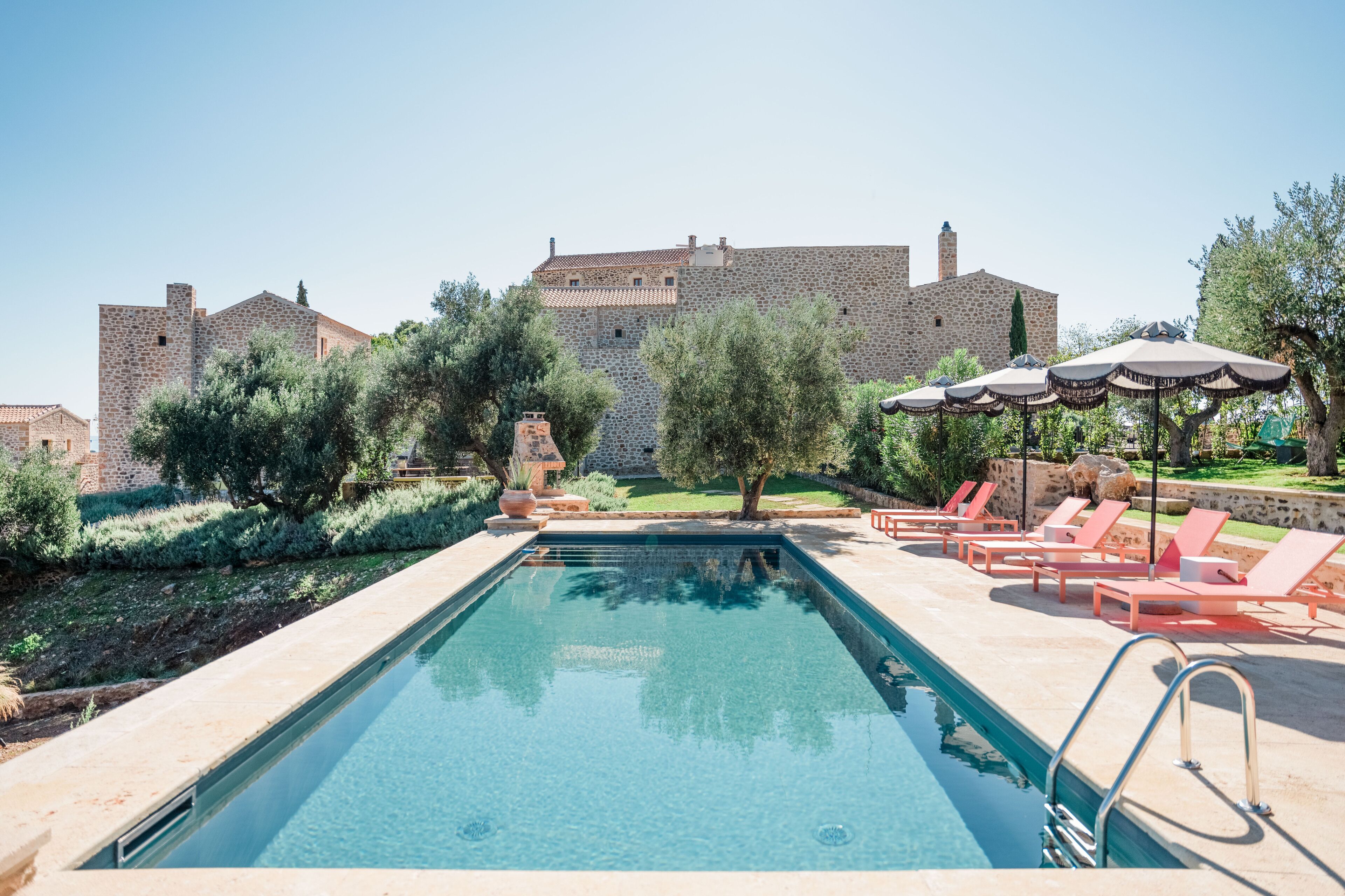 seasonal outdoor pool, open 9:00 am to 7:00 pm, pool umbrellas