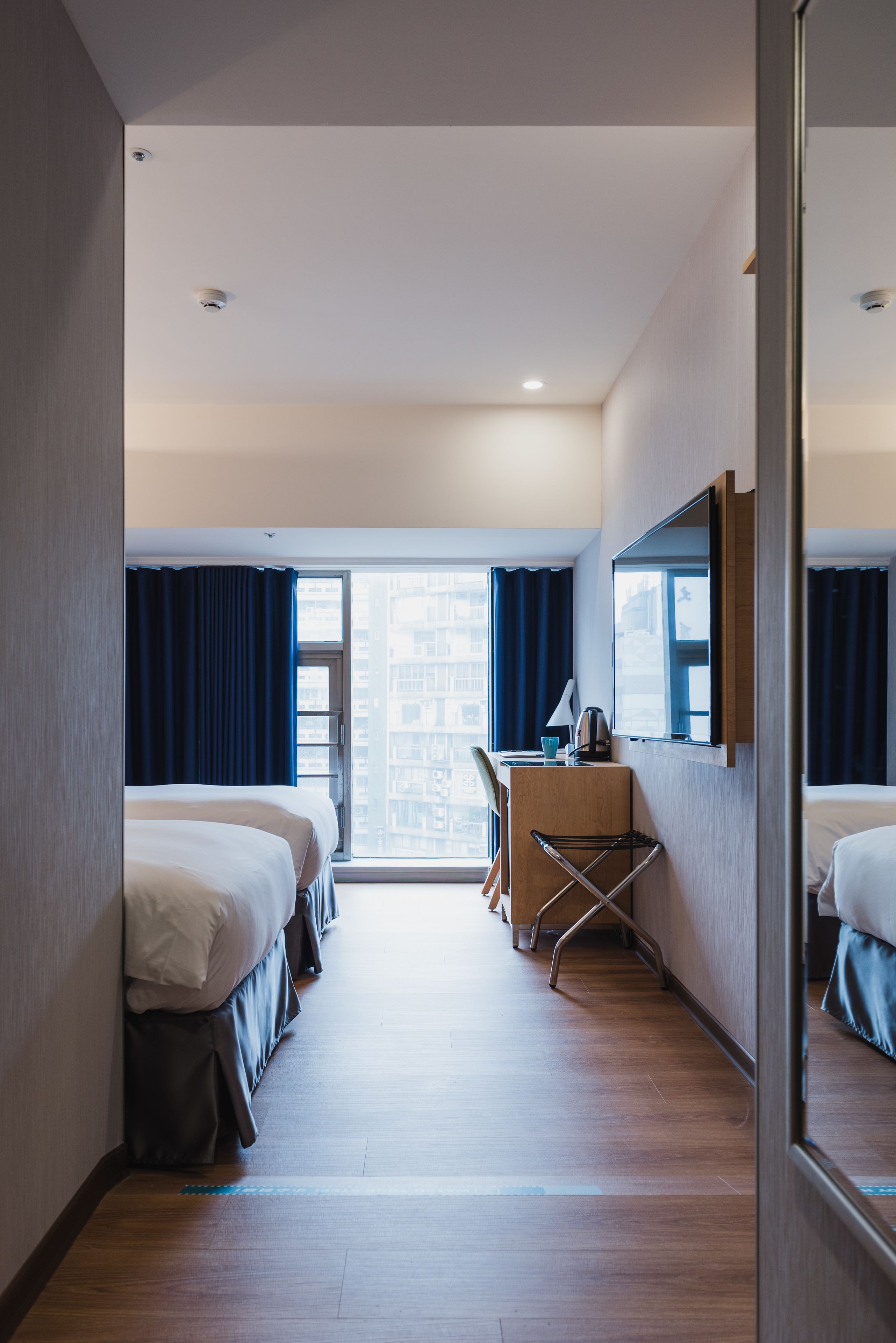 business double or twin room, city view | down duvets, free minibar, in-room safe, desk